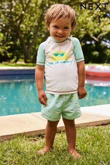 Grün/weißes Lächeln - Sonnenschutzset aus Oberteil und Shorts (3 Monate bis 7 Jahre) (550494) | 22 € - 28 €