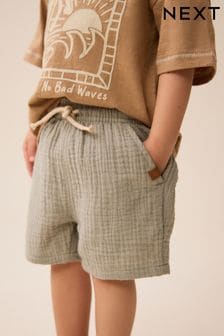 Žajbljevo zelena - Mehke teksturirane bombažne kratke hlače (3 mesecev–7 let) (603302) | €10 - €13