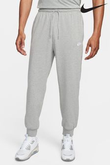 Gri închis - Pantaloni de sport tricotat din fleece Nike Club (610211) | 269 LEI