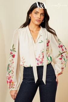 V&A | Love & Roses Ivory White Printed Pussy Bow V Neck Button Through Long Sleeve Blouse (655405) | 281 SAR
