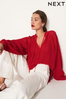 Rot - Plissierte, langärmelige Bluse mit Bindeband am Ausschnitt und Glanzeffekt (663259) | 32 €