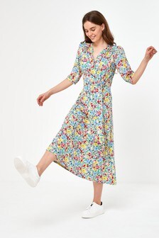 Robe mi-longue avec nœud sur le devant