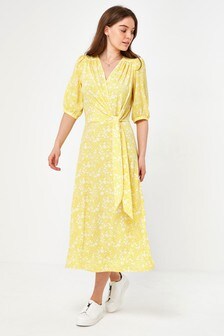 Robe mi-longue avec nœud sur le devant