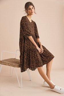 Robe mi-longue à superpositions