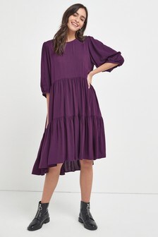 Robe mi-longue à superpositions