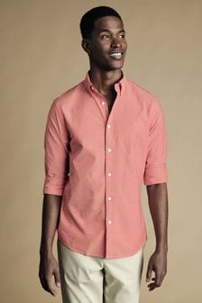 Rosa - Camisa Oxford entallada lisa y elástica con botones y efecto lavado de Charles Tyrwhitt (868687) | 85 €