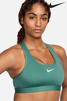 Зеленый/белый - Спортивный топ-бра средней степени поддержки с уплотненными чашечками и логотипом Nike (876505) | €53