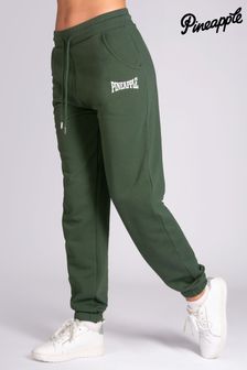 Зеленый - Женские спортивные брюки свободного кроя с карманом и манжетами (896410) | €48