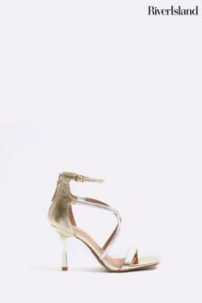 River Island Gold Closed Cross Strap Sandals (900610) | INR 4,886
