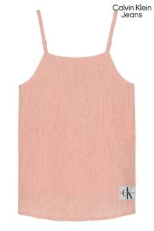 Różowy dziewczęcy top Calvin Klein Jeans z marszczonego materiału na ramiączkach (939039) | 190 zł