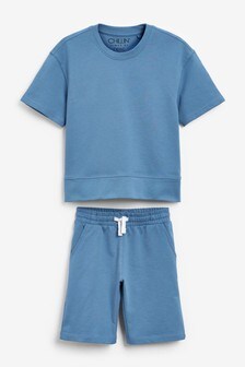 Ensemble confort avec haut et short (3-16 ans)