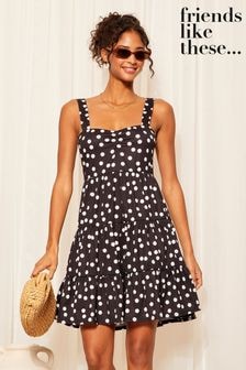 Friends Like These Black/White Polka Dot Strappy Tiered Mini Dress (963849) | $50