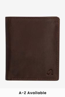 Коричневый - Вместительный кожаный бумажник с монограммой (966862) | €23
