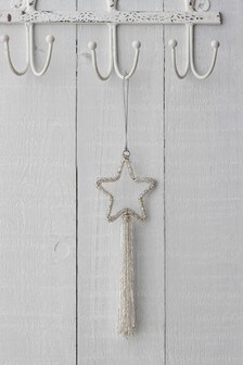 קישוט תלוי בצורת כוכב מכסף