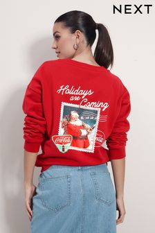 Red License Coca-Cola Christmas Graphic Crew Neck Sweatshirt (994139) | SGD 56
