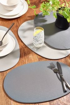 Set of 4 Grey Faux Leather Grey Oval Reversible Placemats (A57808) | €34