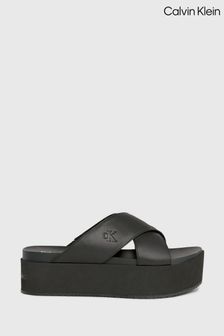 Calvin Klein Black Flatform Cross Sandals (B14441) | $236
