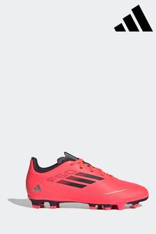 Red football trainers top
