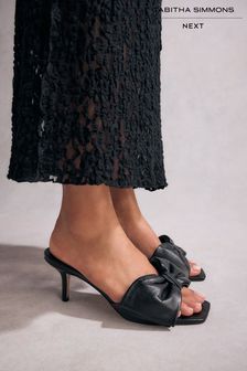 Low black mules deals