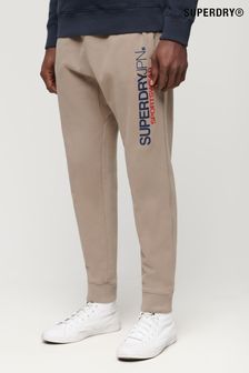 Joggery Superdry Odzież sportowa ze zwężanymi nogawkami z Spodnie do biegania (B70438) | 345 zł