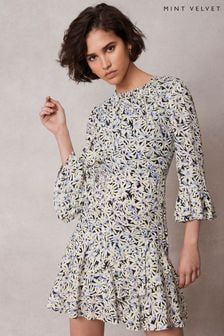 Mint Velvet mini-robe à volants et imprimé floral (B83311) | €128