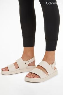 Calvin Klein Cream Flat Leather Sandals (B89301) | $307