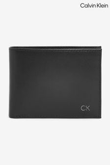 Calvin Klein - Portafoglio con portamonete e logo Ck liscio nero (C10937) | €85