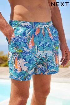 Голубой с гавайским принтом  - Пляжные шорты с рисунком (C23693) | €8