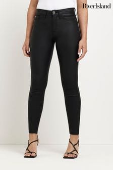 River Island Black Petite Mid Rise Coated Skinny Jeans (C29146) | $108