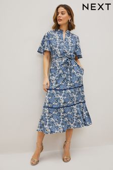 Niebieska z nadrukiem paisley - Sukienka midi z zamkiem pod szyją (C71828) | 191 zł