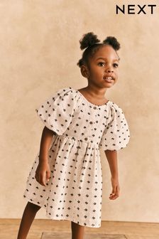 Schwarz/Creme strukturiert - Kleid mit Puffärmeln (3 Monate bis 8 Jahre) (C76043) | 20 € - 24 €