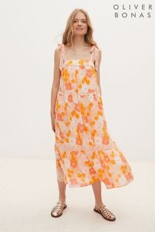 Pomarańczowa sukienka midi z nadrukiem w kwiaty Oliver Bonas (C90217) | 250 zł