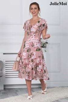 Różowa sukienka z siateczką w motywy kwiatowe Jolie Moi Acela (C95349) | 267 zł