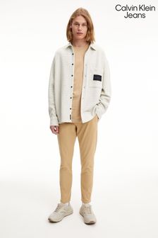 Calvin Klein Jeans - Wit gebreid overhemd met monologo en badge (C96880) | €81