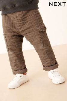 Sivkasto rjava - Mehke teksturirane podložene bombažne hlače (3 mesecev–7 let) (C97489) | €12 - €14
