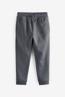  (C97993) | €15 - €22 Grigio antracite - Pantaloni da jogging con caviglie elasticizzate (3-17 anni)