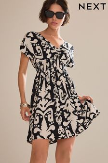 Mono Ikat Print Shirred Waist V-Neck Sleeveless Mini Dress (D09622) | €13