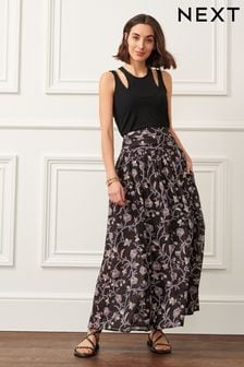Negro floral - Falda a media pierna de algodón (D09816) | 34 €