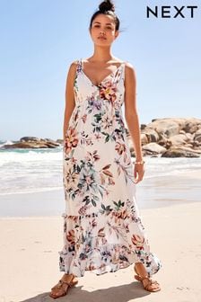 Weißes Modell mit floralem Muster - Maxi-Sommerkleid mit Dekolleté und Neckholder (D23819) | 51 €