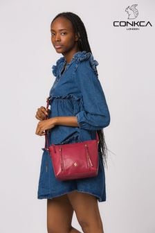 Różowa orchidea - Skórzana torebka crossbody Conkca Pip (D32766) | 245 zł