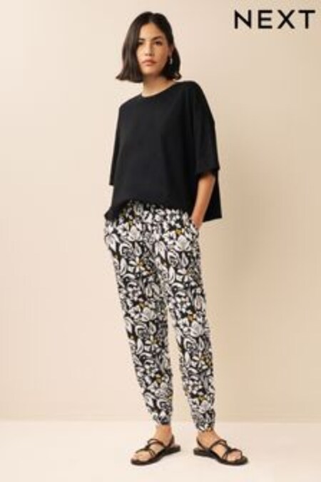 Imprimé floral noir et blanc - Pantalon de jogging en jersey (D53247) | €17