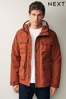 Rdzawy brąz - Deszczoodporna długa kurtka podszyta barankiem z 4 kieszeniami (D76006) | 515 zł