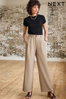 Norkowy brąz - Dopasowane spodnie z elastycznym tyłem i szerokimi nogawkami (D82996) | 86 zł