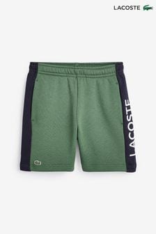 Зеленые детские шорты в стиле колор блок Lacoste (D89972) | €22 - €31