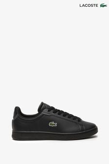 حذاء رياضي Carnaby Pro لون أسود للجنسين من الصغار من Lacoste (D90926) | 351 ر.س