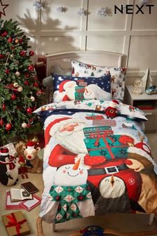 Ensemble housse de couette et taie d’oreiller Père Noël et cadeaux (D95134) | 27€ - 39€