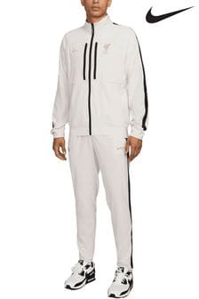 Nike tracksuit with white stripe shop