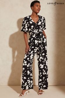 Love & Roses Black and White Printed V Neck Short Sleeve Tie Waist Button Wide Leg Jumpsuit (K38604) | €22