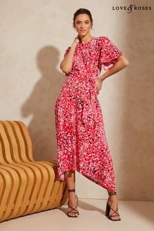 Love & Roses Pink Spot Printed Hanky Hem Jersey Midi Dress (K47863) | 135 zł