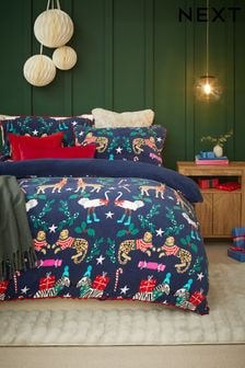 Navy Blue Christmas Safari Leopard Printed Fleece With Red Trim Detailing And Cosy Fleece Reverse Duvet Cover And Pillowcase Set (K85658) | $45 - $93